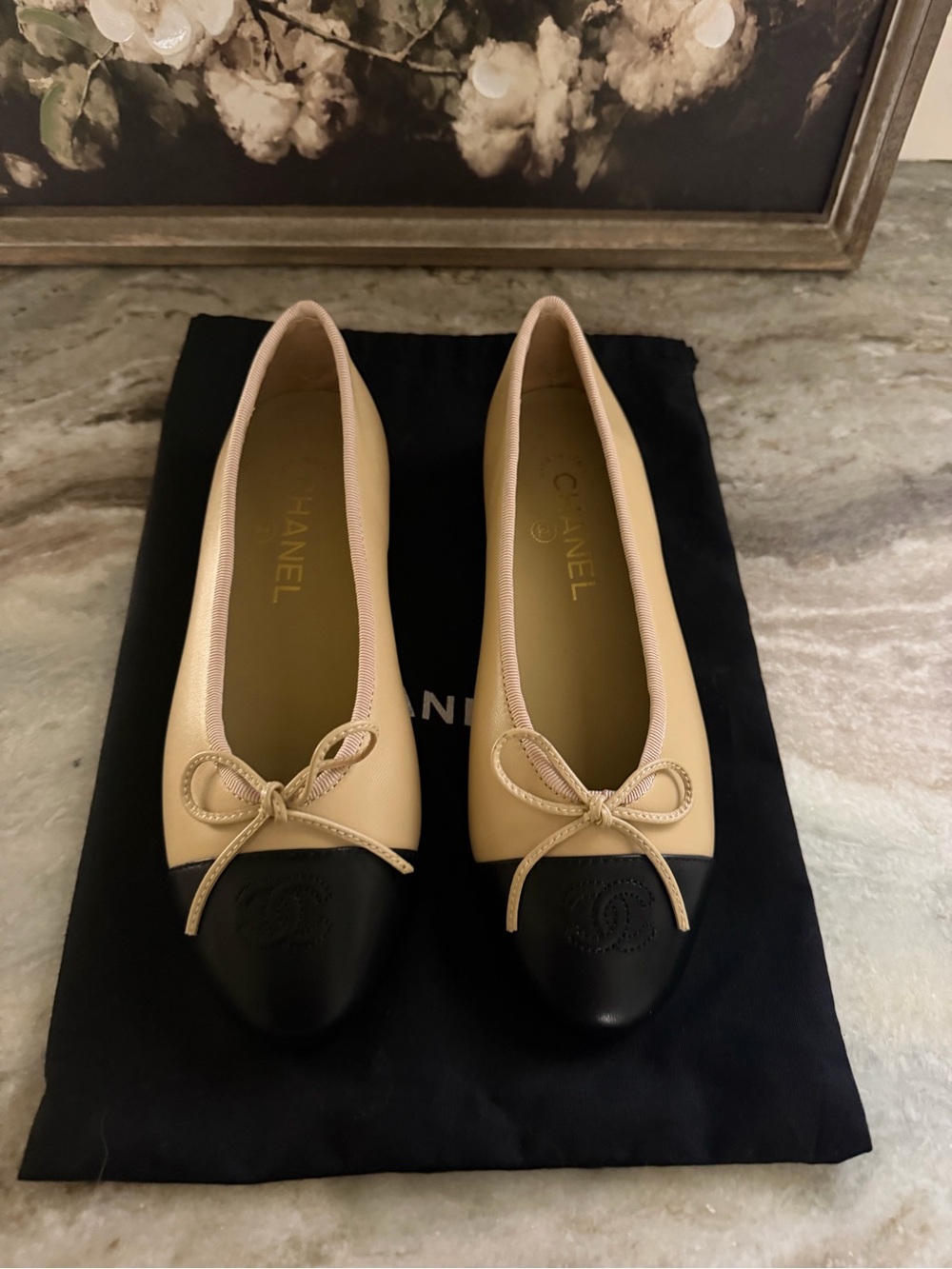 CHANEL Beige and Black Cap-Toe Bow Ballet Flats